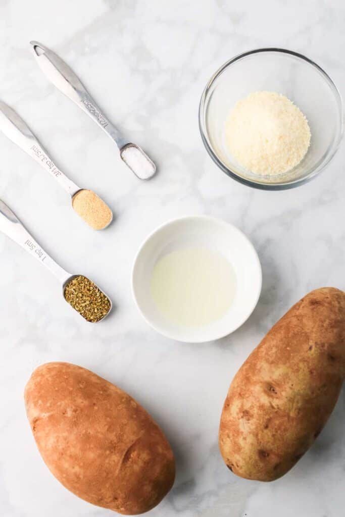 potatoes and ingredients on countertop 