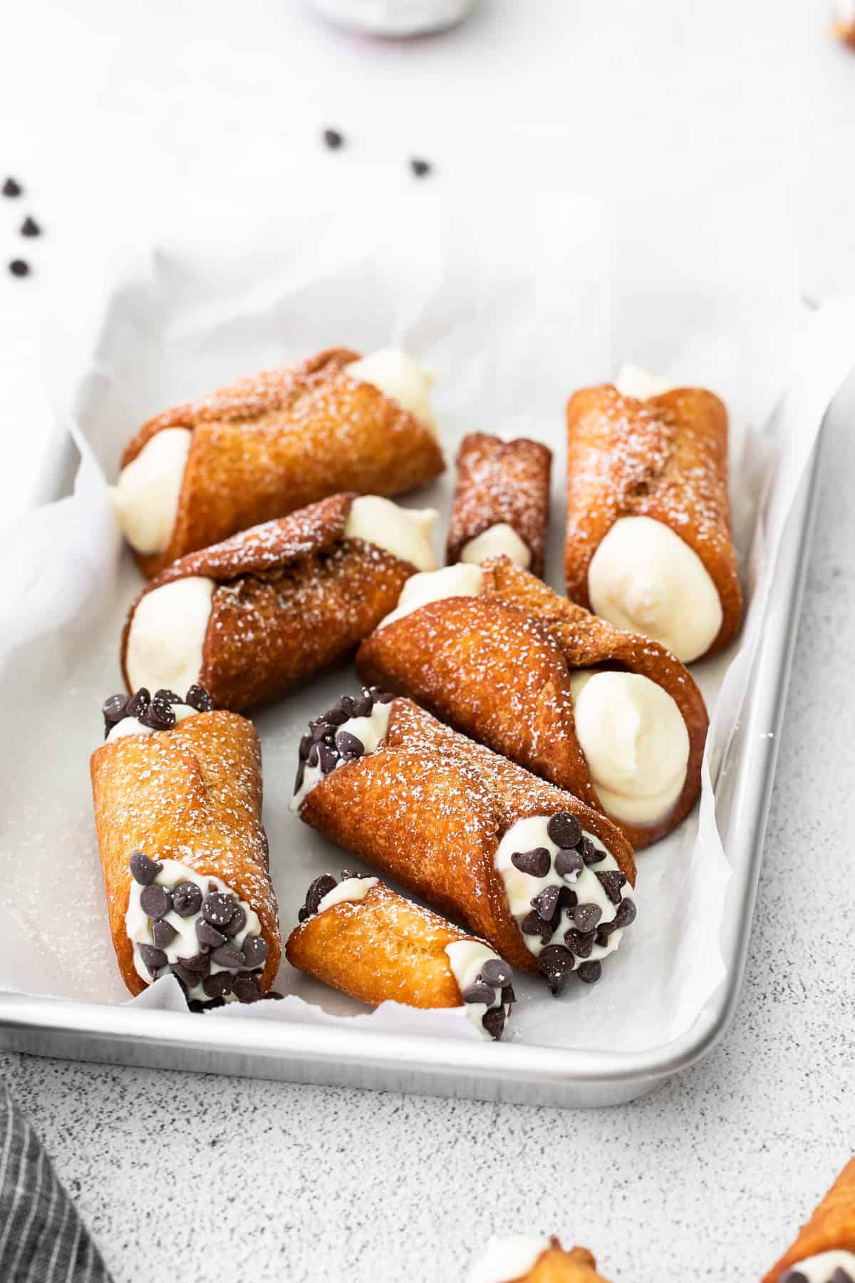 Cannolis on a serving platter.