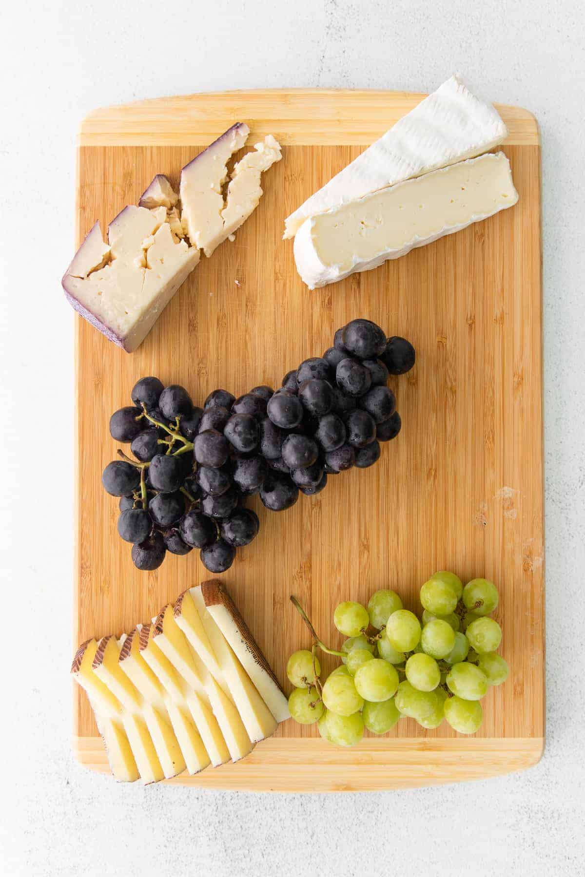 grapes on cutting board