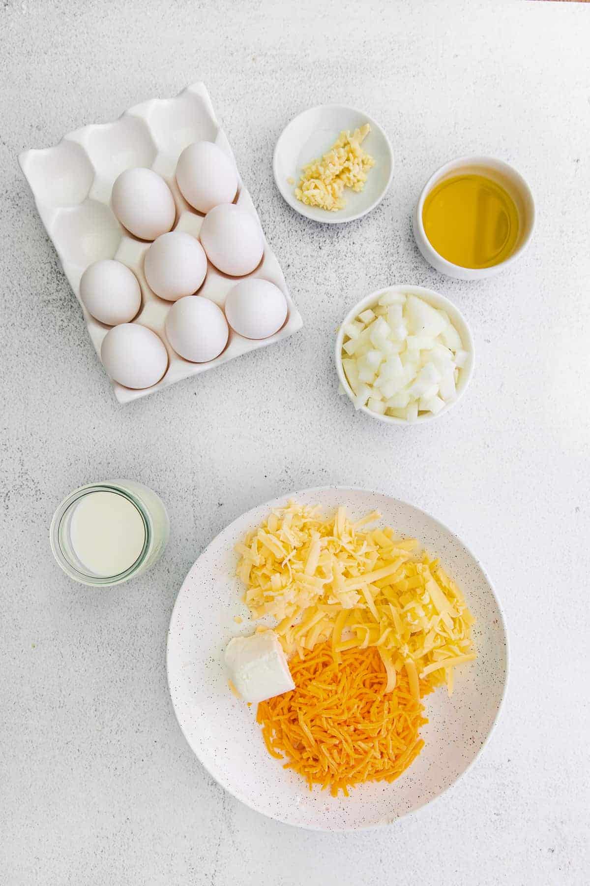 ingredients for four cheese frittata ready to be mixed together and baked