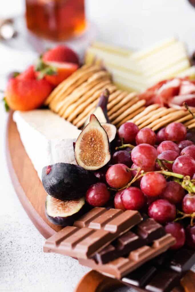 figs on a chocolate and cheese board