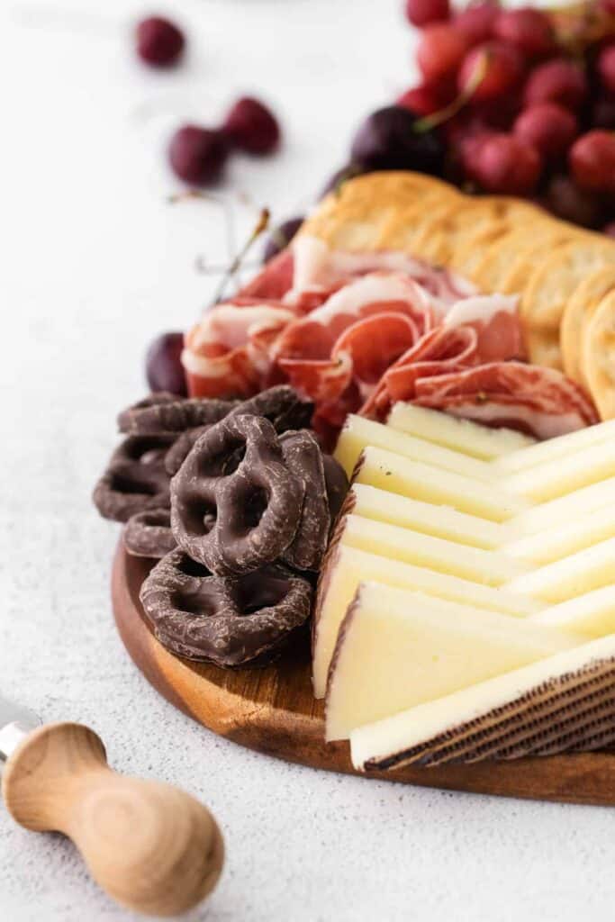 close up image of a chocolate and cheese board