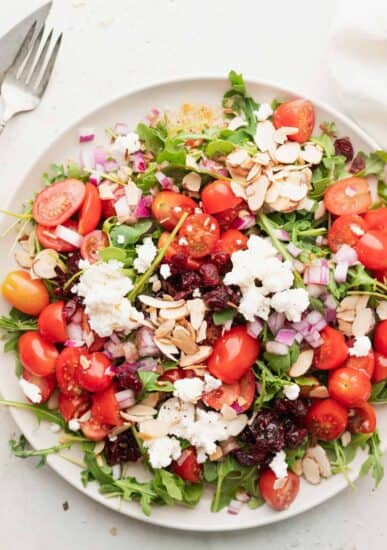 arugula goat cheese salad on a plate