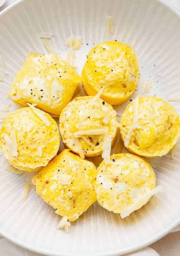 a plate of cheesy egg bites