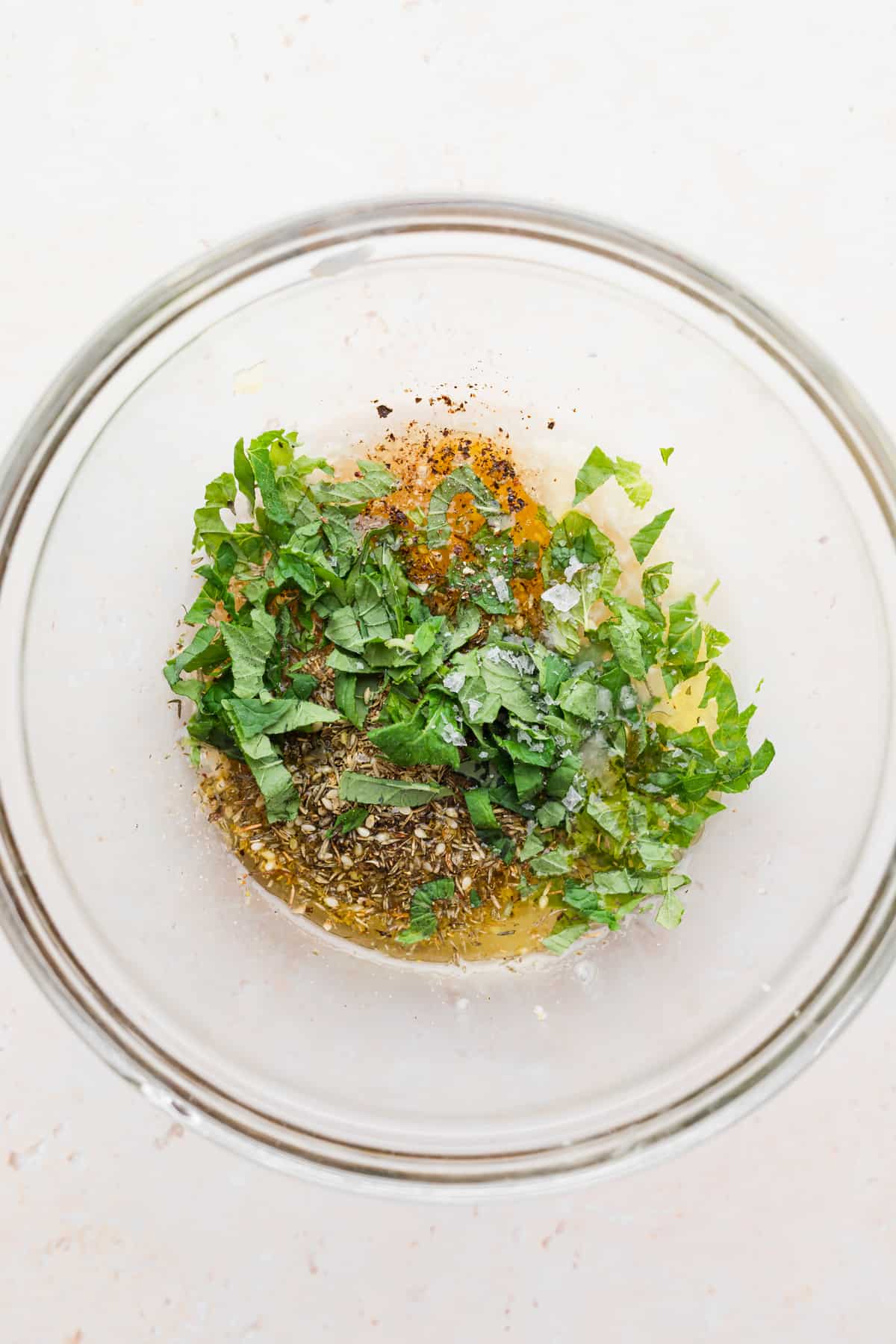 marinade for grilled halloumi skewers in a bowl