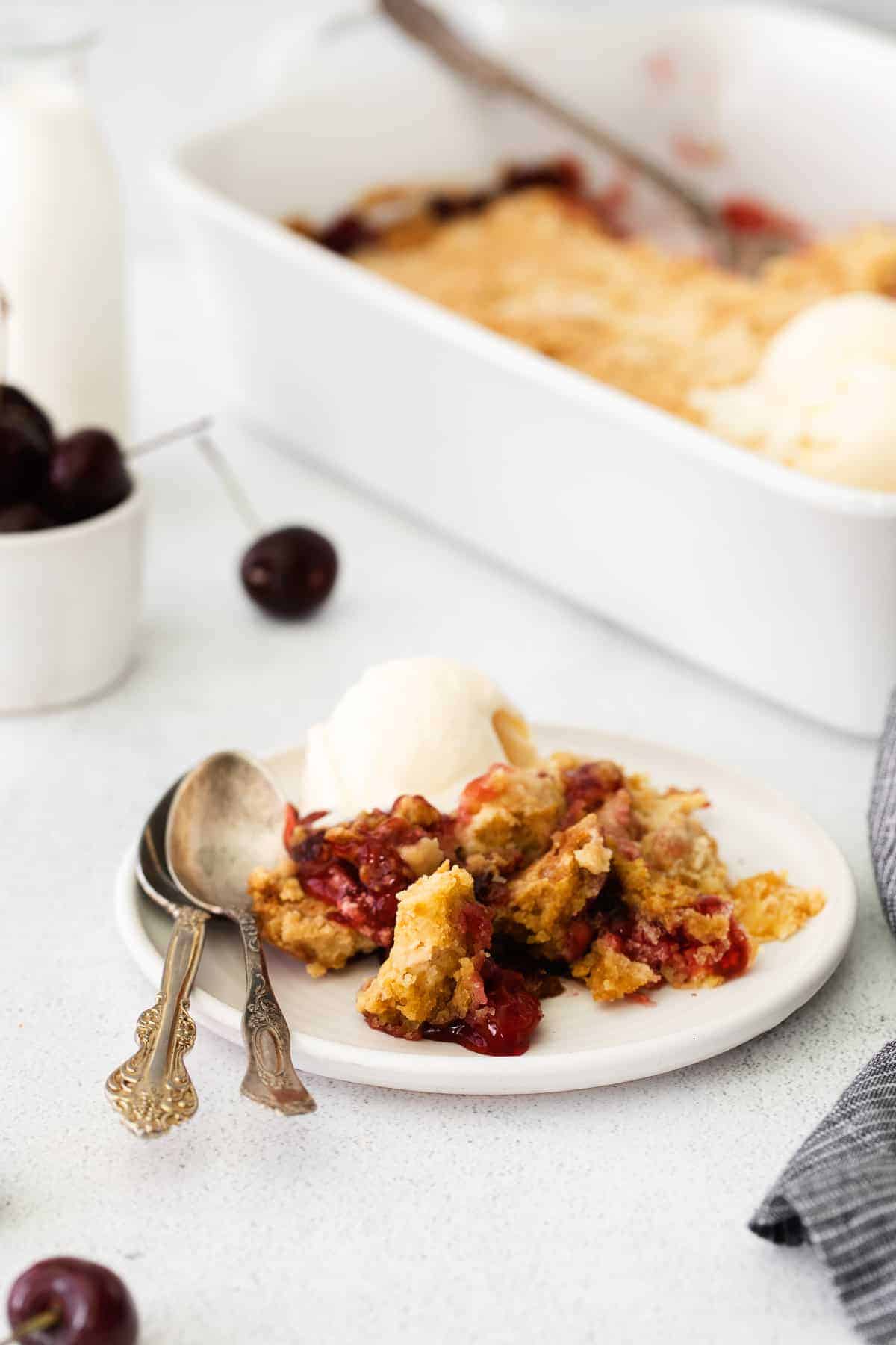 cherry dump cake on plate.