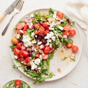 arugula goat cheese salad on a plate