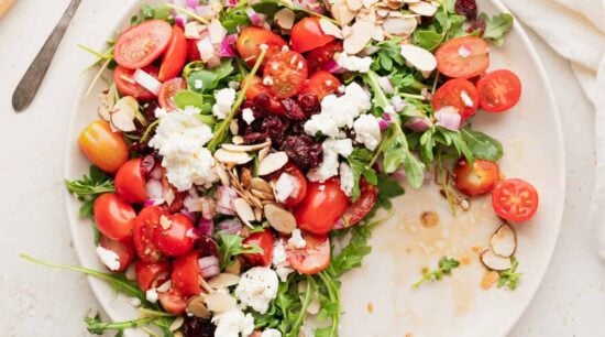 arugula goat cheese salad on a plate