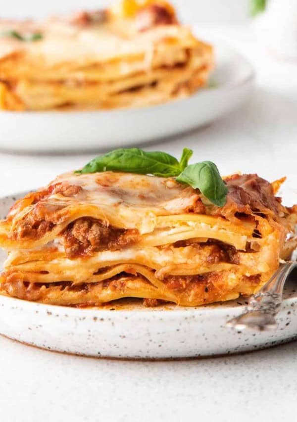 a slice of meat lasagna on a plate