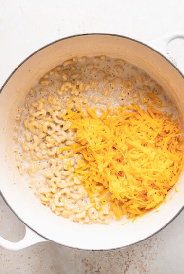 cheesy macaroni and cheese in a pot.