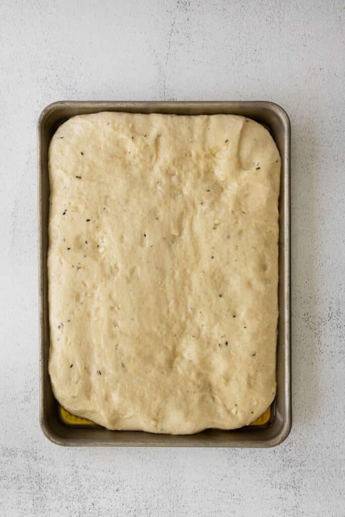 dough in pan with olive oil