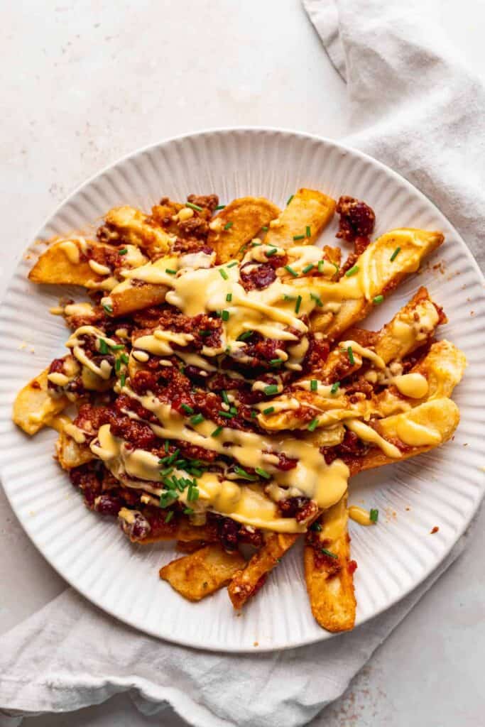 chili cheese fries on a plate