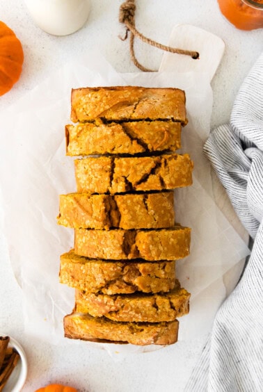 a stack of pumpkin cream cheese bread stacked on top of each other.