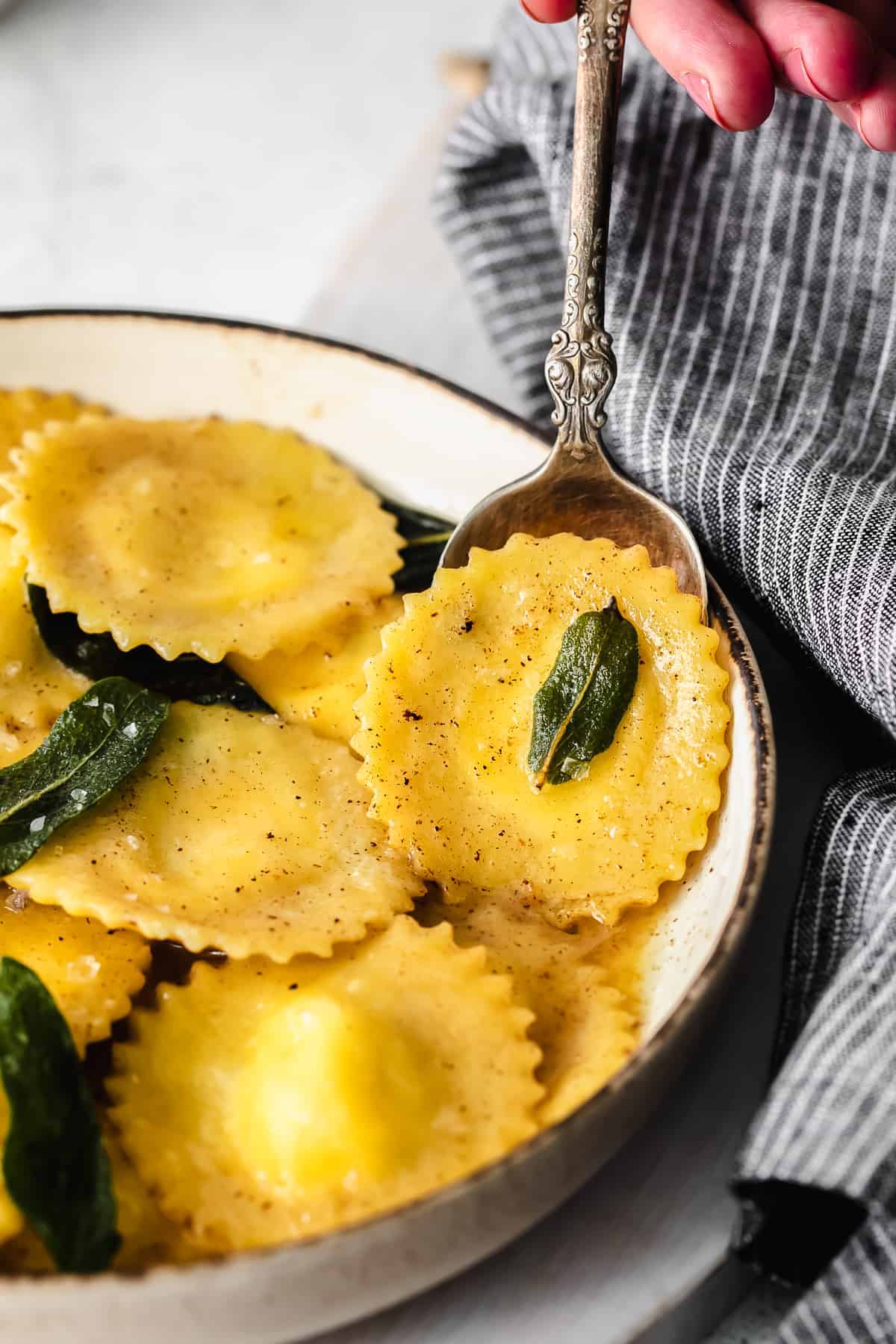 goat cheese ravioli on a spoon