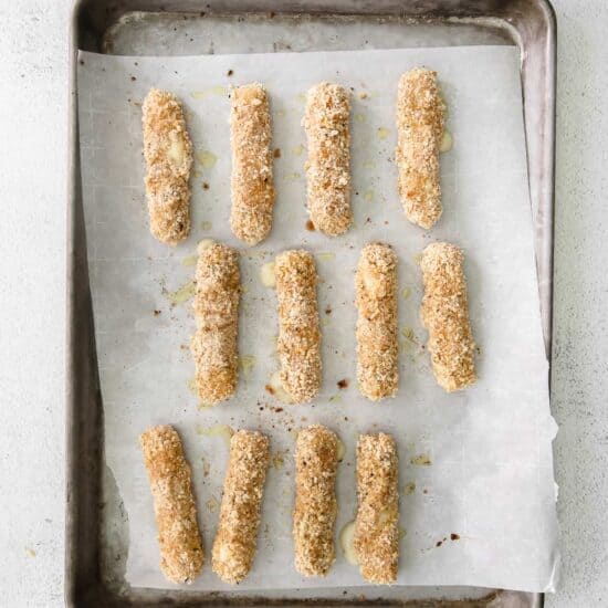 a tray of homemade bread sticks.