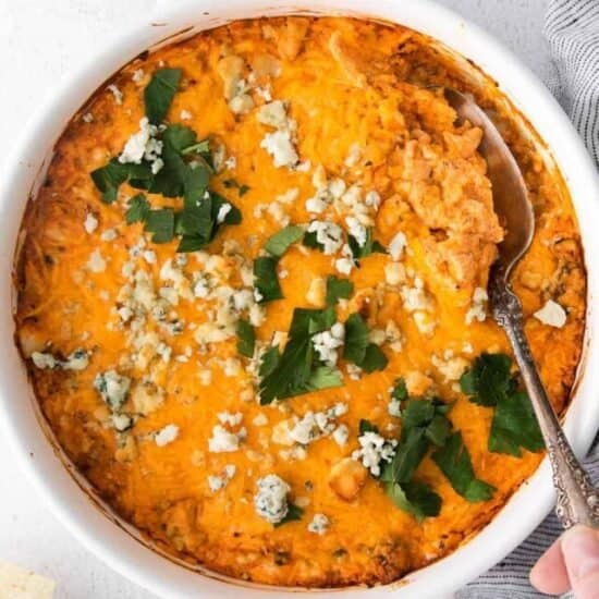 Blue Cheese Buffalo Chicken Dip with a spoon