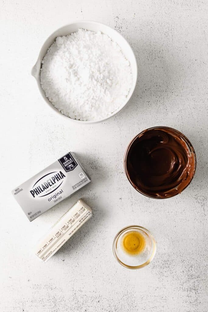All the ingredients you need for chocolate cream cheese frosting. 