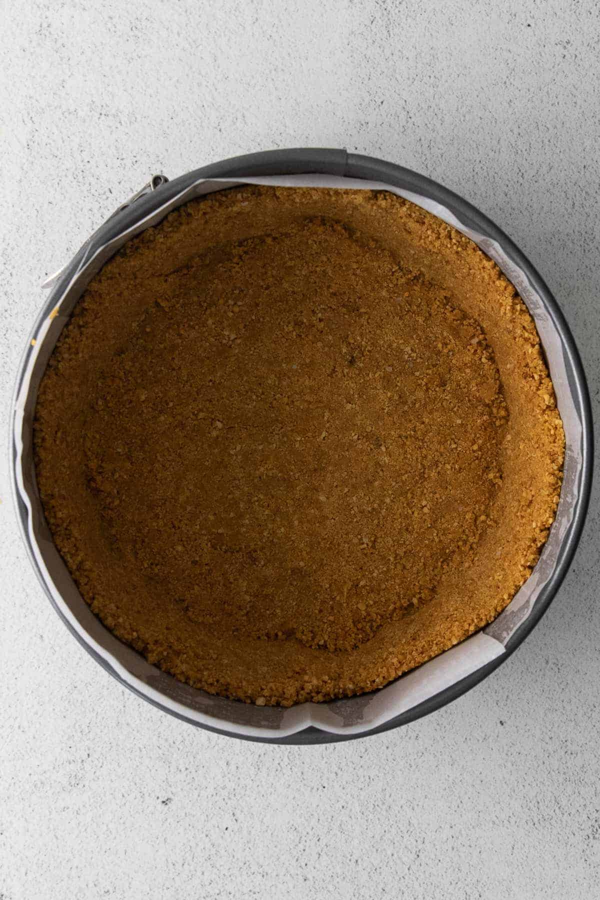 graham cracker crust pressed into a springform pan