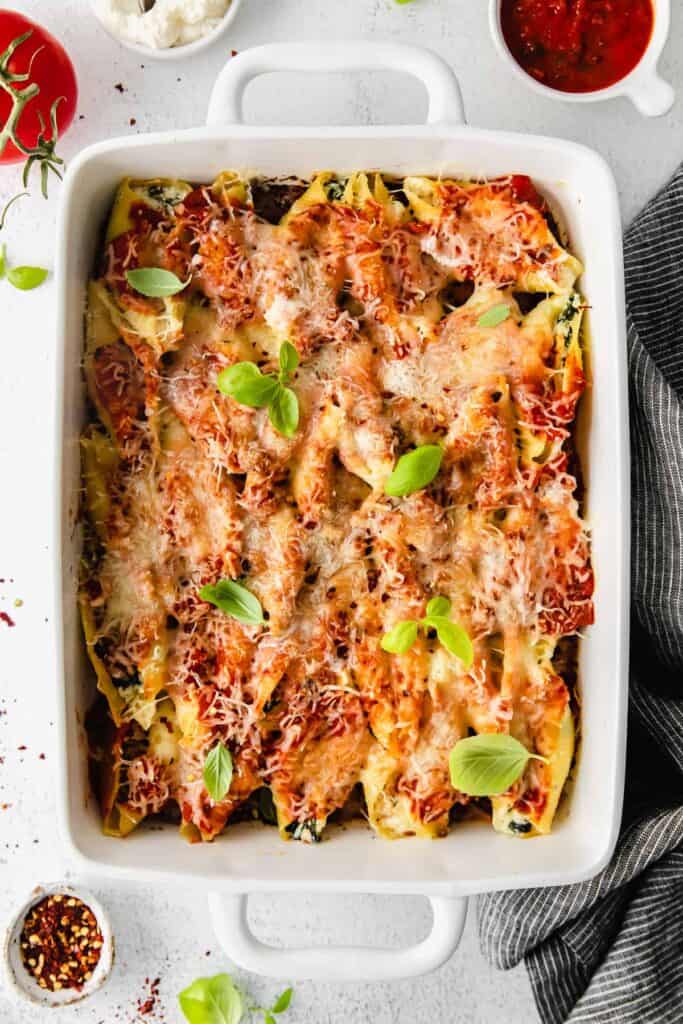 ricotta stuffed shells in a casserole dish after being baked