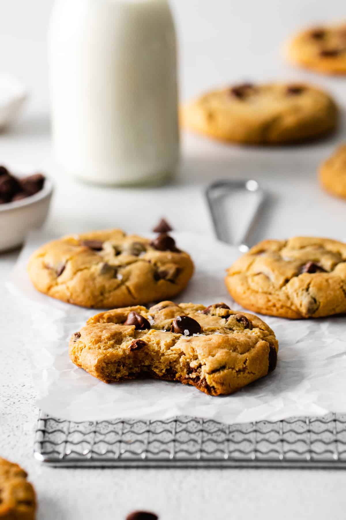 cream cheese chocolate chip cookie with a bite taken out of it