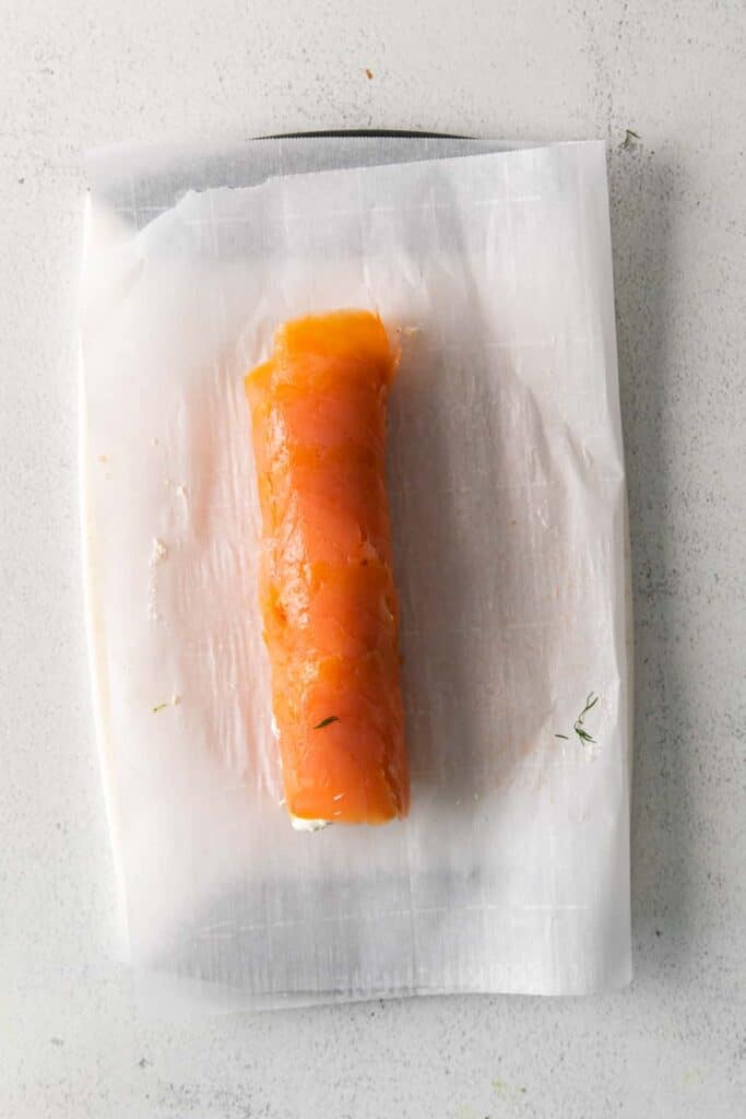 smoked salmon roll on parchment paper