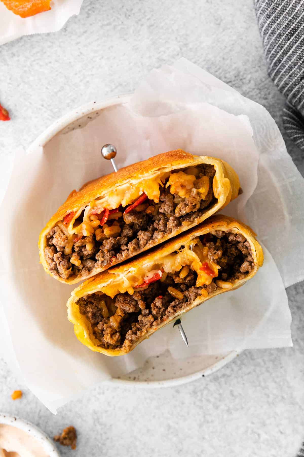 Taco Bell Grilled Cheese Burrito cut in half.