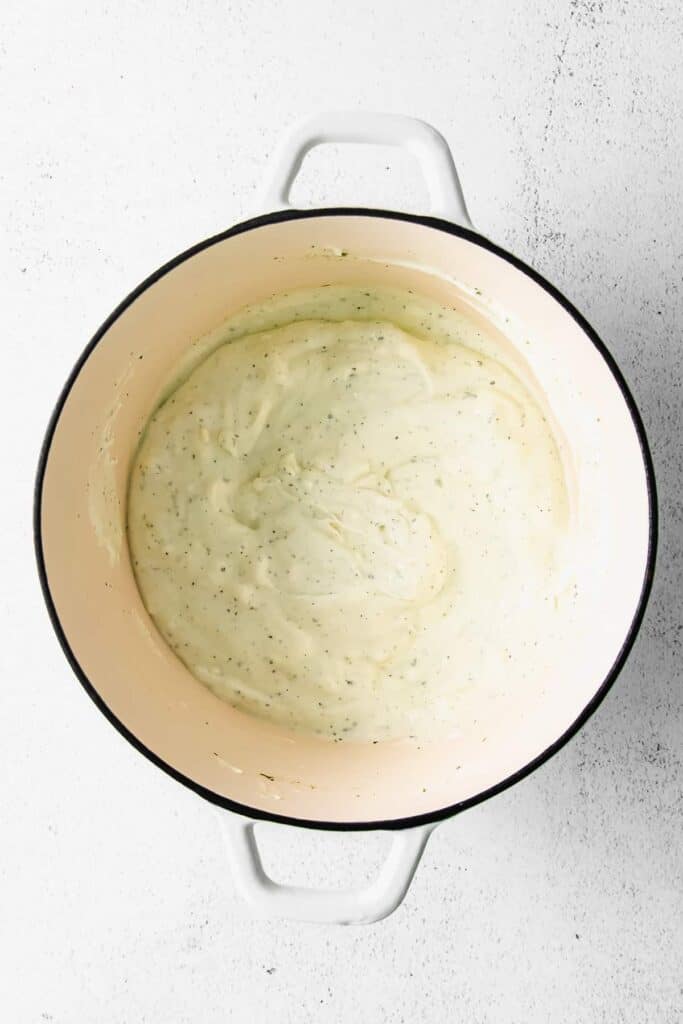 melted cheese for chicken bacon ranch dip in a pot