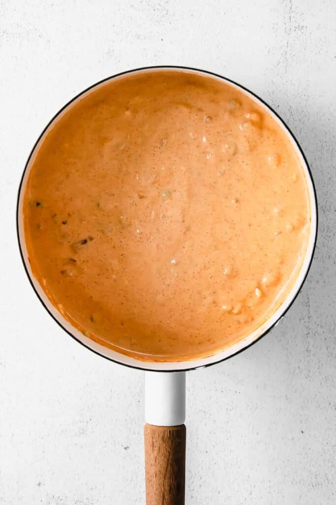 chili cheese dip melted in a sauce pan