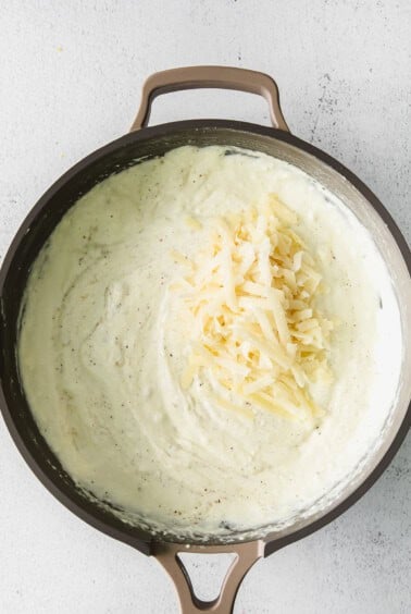 creamy pasta sauce in a skillet.