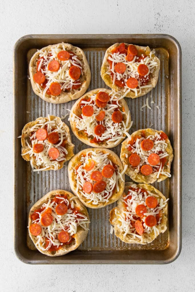 English muffins on baking sheet.