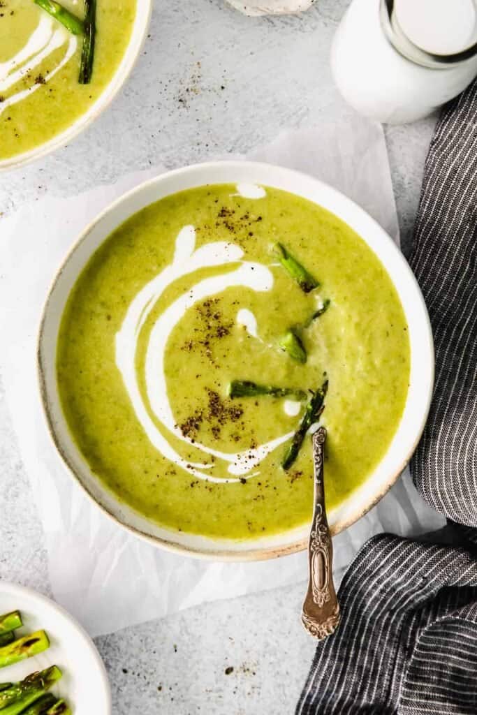 Roasted asparagus soup in bowl.