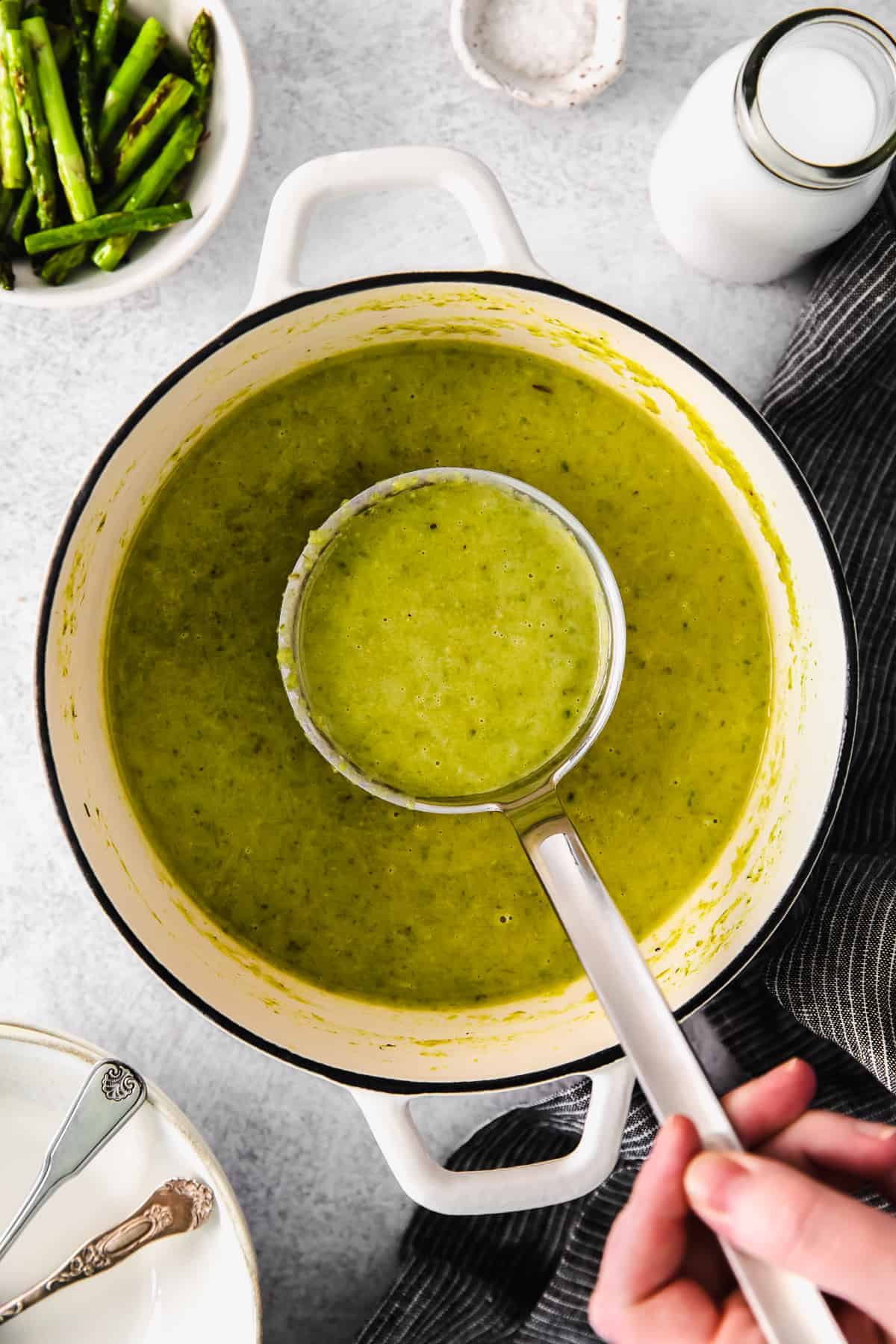 Ladle of asparagus soup.