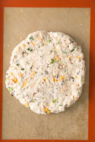 a piece of chicken fried steak on a baking sheet.