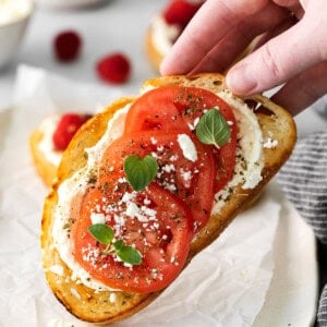 a person holding a mascarpone toast.