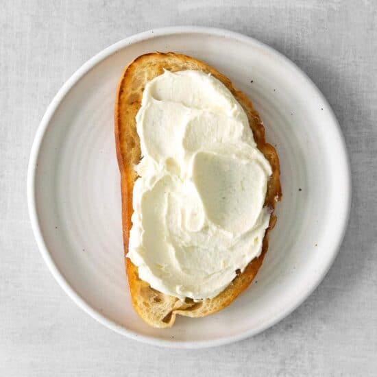 a mascarpone toast topped with whipped cream.
