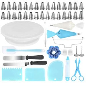 a cake decorating kit with various tools and utensils.