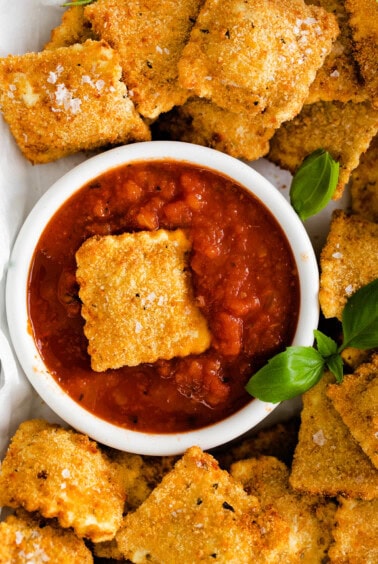 Air fryer ravioli served with marinara.