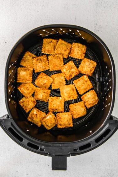 Air fryer ravioli in the air fryer.