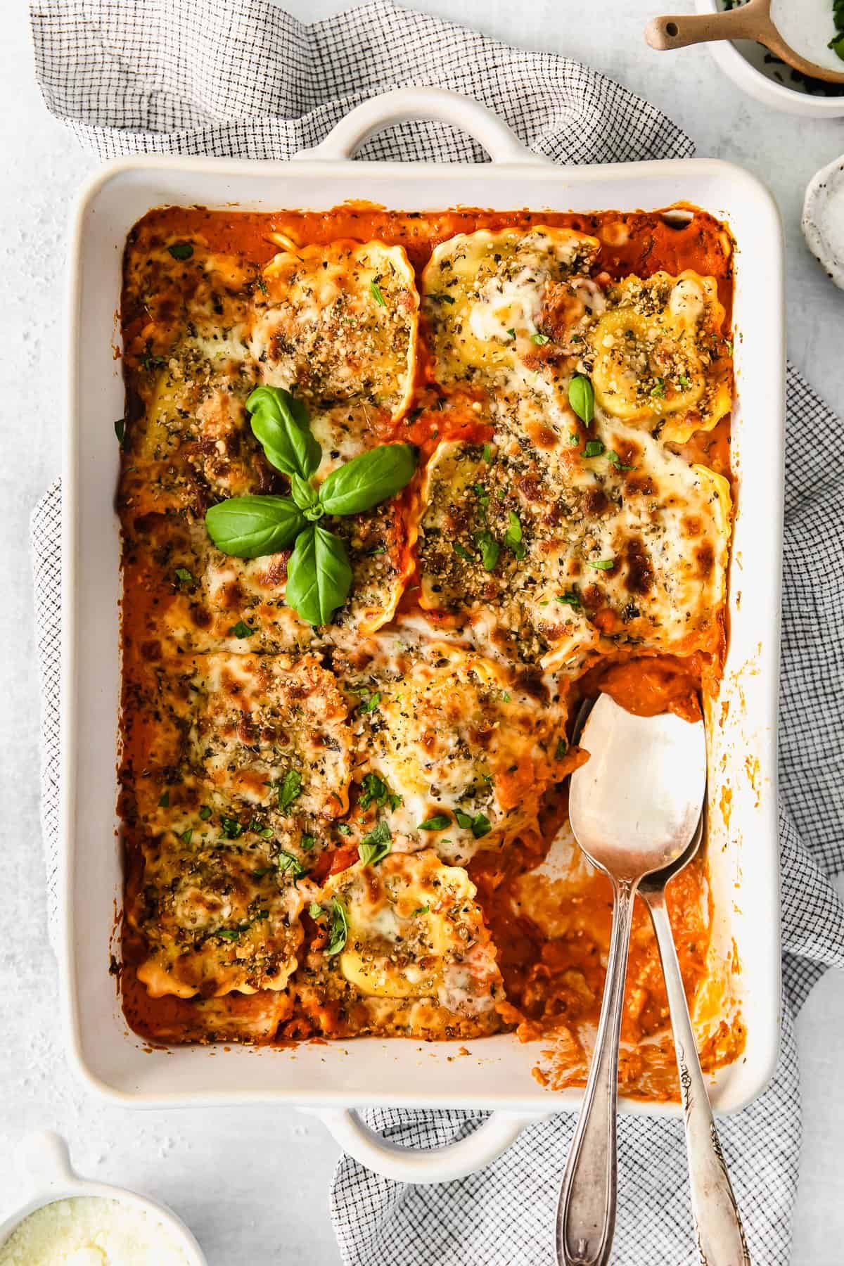 Baked ravioli in a casserole dish. 