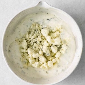 cauliflower dip in a white bowl.