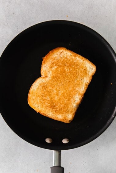 grilled cheese in pan.