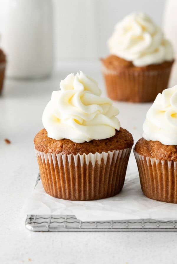 Carrot cake cupcakes with cream cheese frosting.