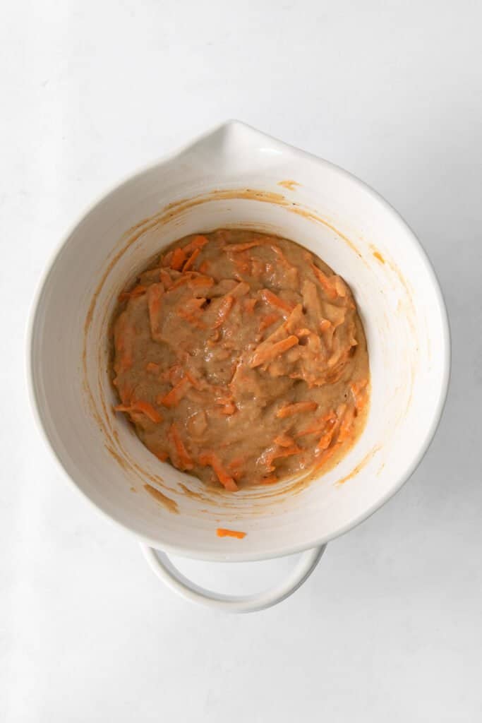 Carrot cake cupcake batter in a mixing bowl. 