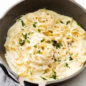 Alfredo sauce in pan.