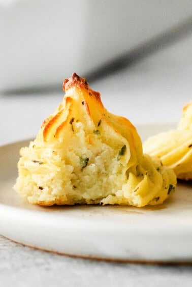 Duchess potato on a plate.