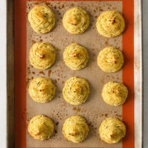 Duchess Potatoes on a baking sheet.