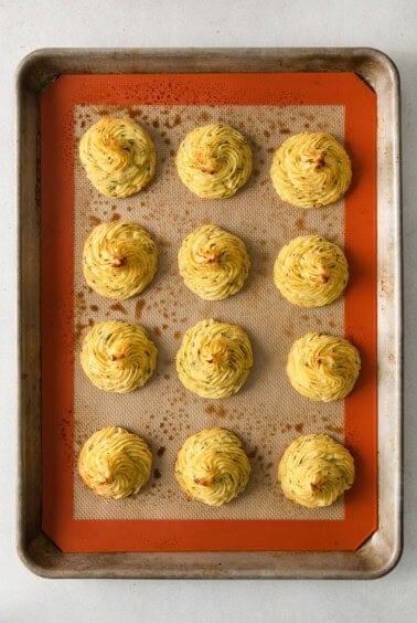 Duchess Potatoes on a baking sheet.