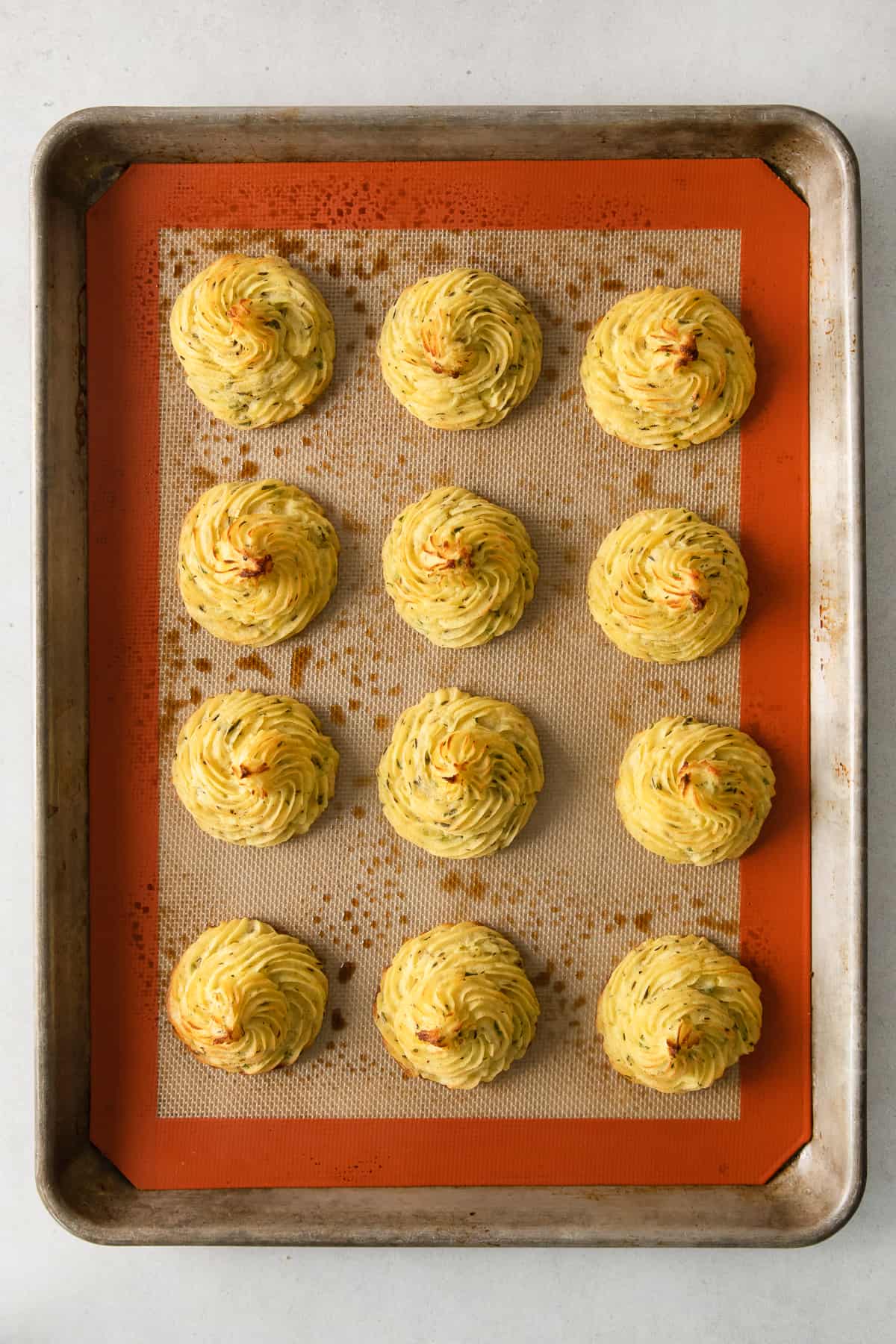 Duchess Potatoes on a baking sheet. 