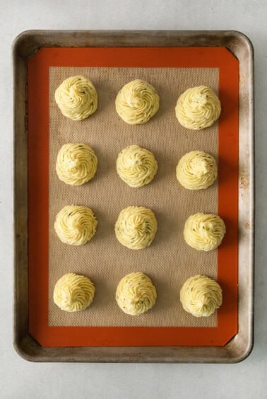 Duchess Potatoes on a baking sheet