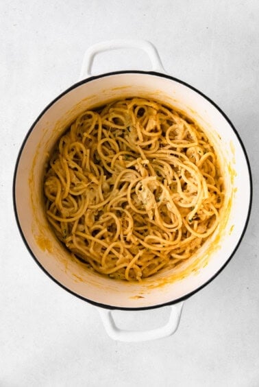 Garlic parmesan pasta ready to eat in a Dutch oven.